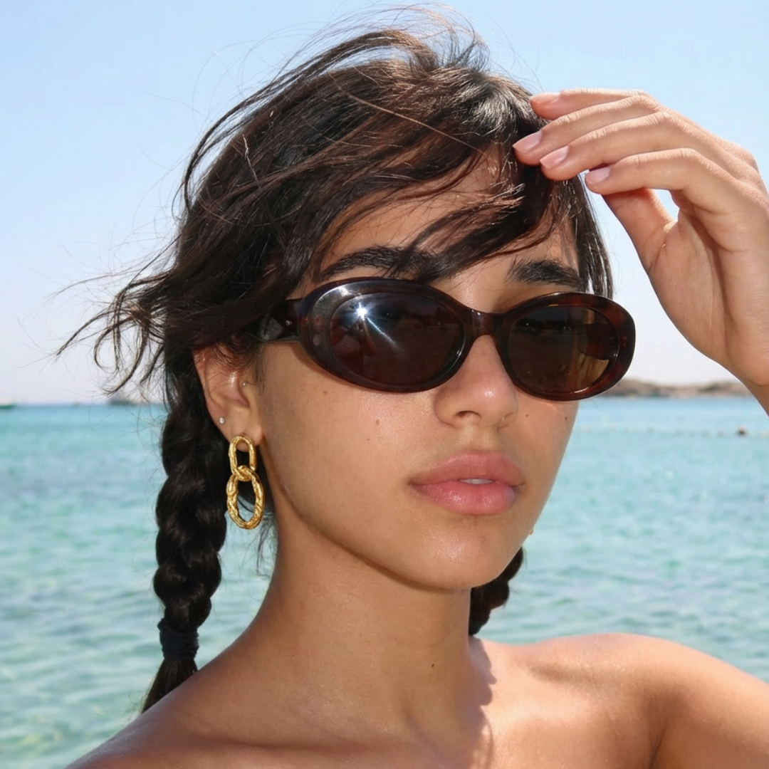 Pendientes de botón dorados