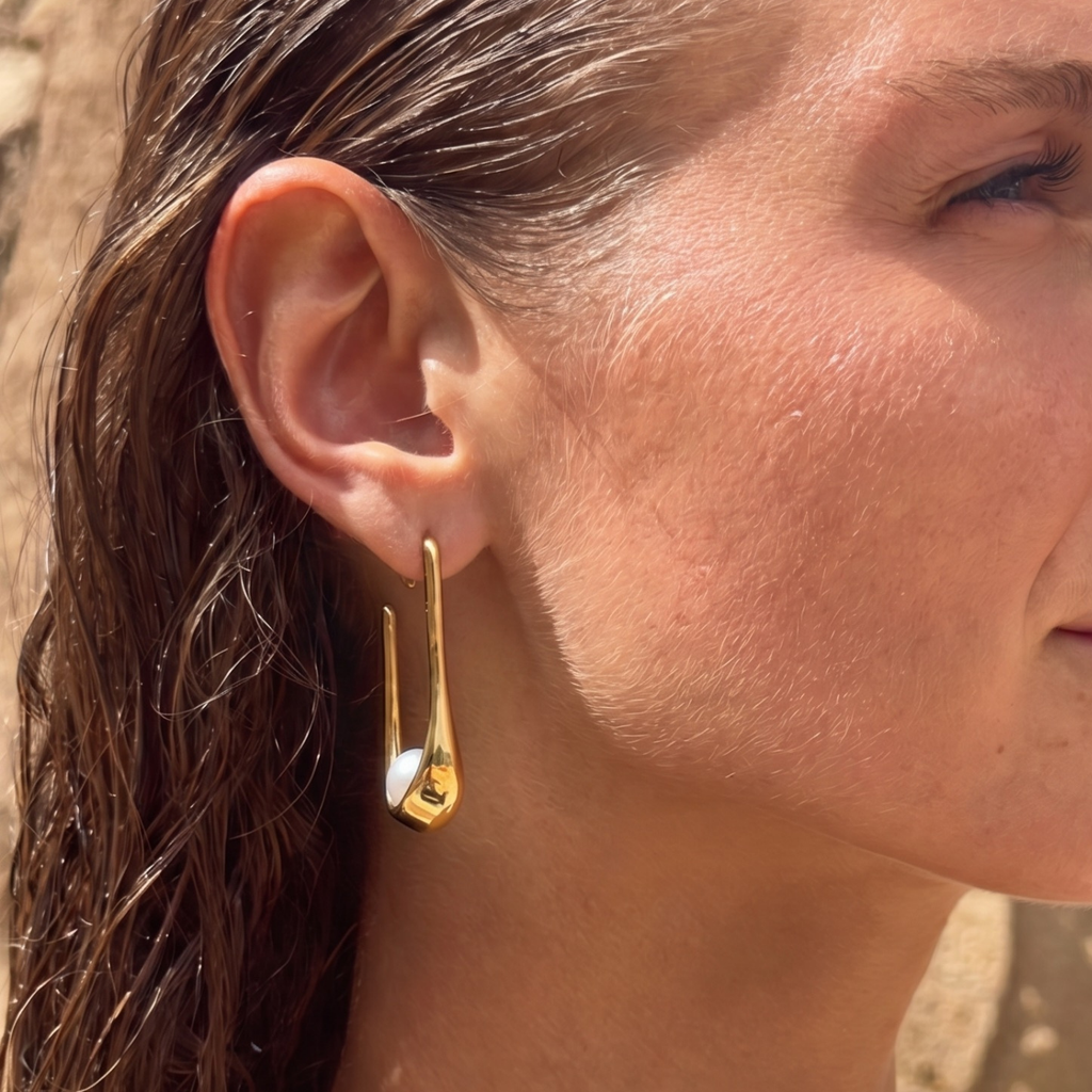 Pendientes en forma de U con perla